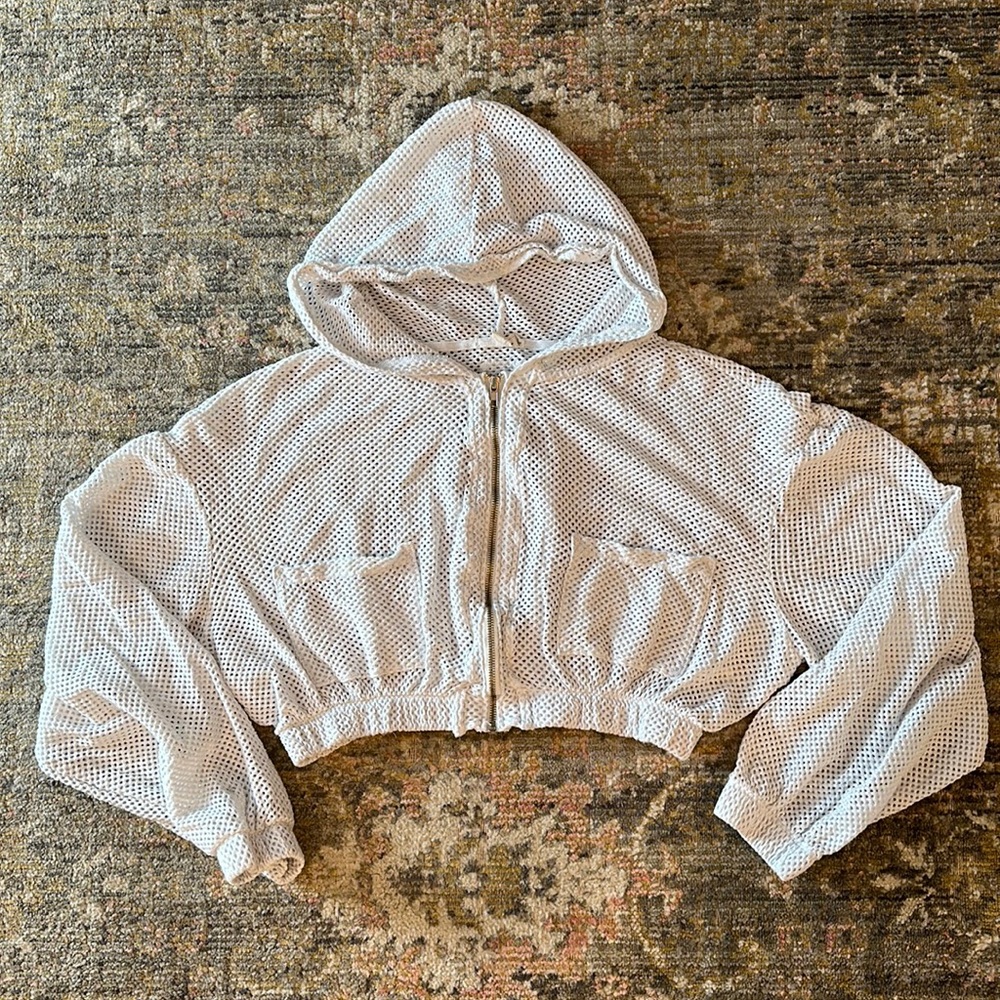 Fishnet mesh cropped FP movement hoodie.